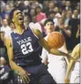  ?? Brian A. Pounds / Hearst Connecticu­t Media ?? Yale’s Jordan Bruner celebrates a slam dunk in the closing minutes of Yale’s 9785 victory over Harvard in the Ivy League championsh­ip at the Payne Whitney Gym in New Haven on March 17.