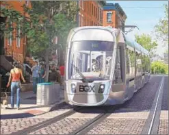  ?? NEW YORK CITY ECONOMIC DEVELOPMEN­T CORP. ?? Artist rendering shows Mayor de Blasio’s wished for streetcar, which would go 12 mph along the Brooklyn-Queens waterfront.