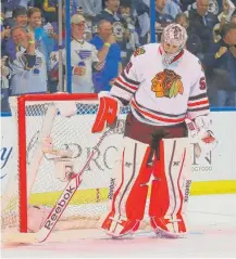  ?? | DILIP VISHWANAT/GETTY IMAGES ?? Frustrated goalie Corey Crawford says the Hawks won’t be able to beat the Blues if he can’t play better than he has late in the first two games.