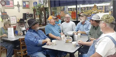  ?? Staff photo by Neil Abeles ?? ■ “Sure, take our picture,” say, from left, James Martin, Pete Allen, Stacy Holland, Frank Washington, Eddie Frank Price and Doug Glover of the morning group.