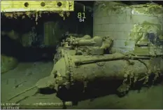  ??  ?? This Monday underwater frame from video courtesy of Paul G. Allen shows a torpedo launcher in the wreckage from the USS Juneau, a U.S. Navy ship sunk by the Japanese torpedoes 76 years ago, found in the South Pacific. COURTESY OF PAUL G. ALLEN VIA AP