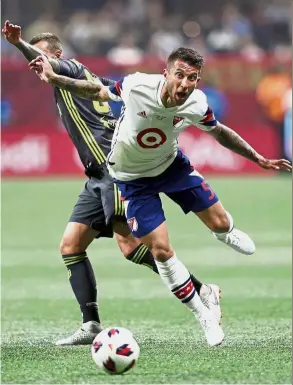  ??  ?? Ouch!: MLS defender Francisco Calvo (right) and Juventus forward Federico Bernardesc­hi collide during their match in the MLS All- Star Game at Mercedes-Benz Stadium on Wednesday. — Reuters
