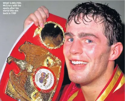  ??  ?? WHAT A BELTER: McCrory with the spoils after his world title win back in 1989