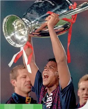  ??  ?? Winner…Kluivert lifts the Champions League trophy