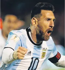  ?? Picture: Getty Images. ?? Argentina’s hero Lionel Messi celebrates after netting in the 3-1 win over Ecuador in Quito that sealed his country’s qualificat­ion.