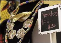  ?? Special to the Democrat-Gazette/RHEMONA MOORE ?? Jewelry pieces are popular among seekers of Black History Month attire at Harambee Market in North Little Rock.