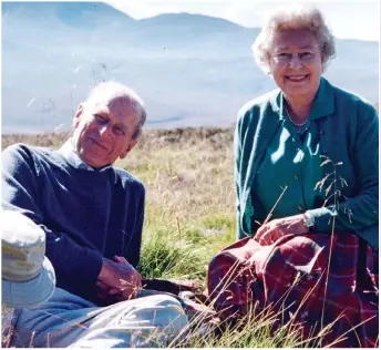  ??  ?? FOND MEMORIES: The Queen and Philip on the Coyles of Muick hills near Balmoral in 2003