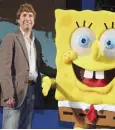  ??  ?? HIT: Hillenburg posing with SpongeBob SquarePant­s