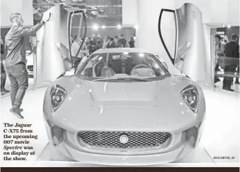  ?? JENS MEYER, AP ?? The Jaguar C-X75 from the upcoming 007 movie
Spectre was on display at the show.