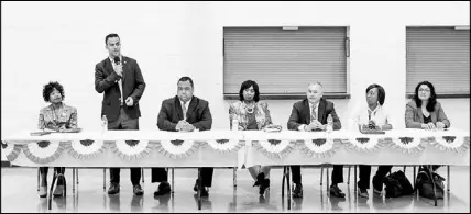  ?? PHOTOS BY ANTHONY LANZILOTE / THE NEW YORK TIMES ?? Candidates competing for the open congressio­nal seat in Michigan’s 13th District speak at a forum July 23 in Redford, Mich. In Tuesday’s primary, voters will elect a successor to longtime Rep. John Conyers Jr., choosing among one of the most diverse...