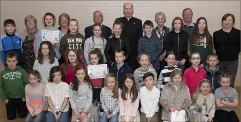  ??  ?? Bishop Denis Brennan presented certificat­es for Creative Spirit Awards winners at Clonard Community Centre.