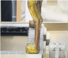  ??  ?? The legs of the gilded bed of ancient Egyptian boy-king Tutankhamu­n.