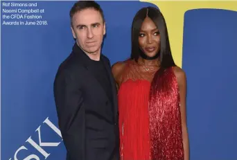  ??  ?? Raf Simons and Naomi Campbell at the CFDA Fashion Awards in June 2018.