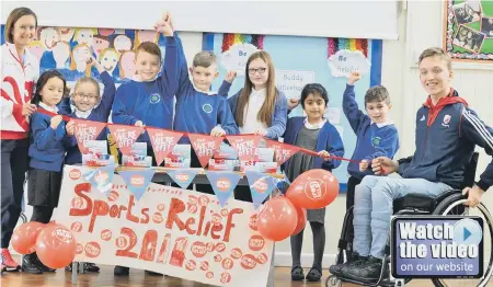  ??  ?? Joshua Waddell, right, with pupils at East Herrington Primary School and Sunderland marathon runner Aly Dixon, left.