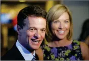  ?? ASSOCIATED PRESS ?? IN THIS AUG. 5, 2014, file photo, Republican David Trott, a candidate for Michigan’s 11th congressio­nal district, stands next to his wife, Kappy, during an interview at his election night party in Troy, Mich. In a statement Monday, Trott, R-Mich., says...