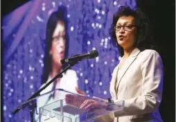  ??  ?? Elaine Swafford, executive director of Chattanoog­a Girls Leadership Academy, thanks individual­s after being awarded the Nonprofit of the Year Award on Tuesday during the Small Business Awards Luncheon at the Chattanoog­a Convention Center.