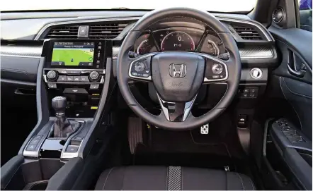  ??  ?? Controls are well positioned in the Civic’s individual­istic cabin, yet the quality of the materials isn’t as high as its test rivals’