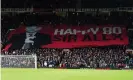  ?? End. Photograph: Martin Rickett/PA ?? A banner celebratin­g Sir Alex Ferguson’s 80th birthday is unfurled at the Stretford