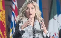  ?? ADRIAN WYLD THE CANADIAN PRESS ?? Michelle Rempel Garner, the Conservati­ve health critic, argues the government should have told people to wear masks sooner.