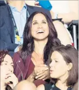  ?? NATHAN DENETTE/THE CANADIAN PRESS ?? Meghan Markle, center, takes in the opening ceremonies of the Invictus Games in Toronto on Saturday.