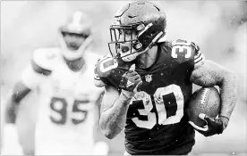  ?? DON WRIGHT THE ASSOCIATED PRESS ?? Pittsburgh Steelers running back James Conner is thriving in Le’Veon Bell’s absence. And at a fraction of the cost, Conner is putting pressure on holdout Bell to sign long term.