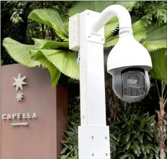  ??  ?? A CCTV camera is seen in front of an entrance to the Capella Hotel. — Reuters photo