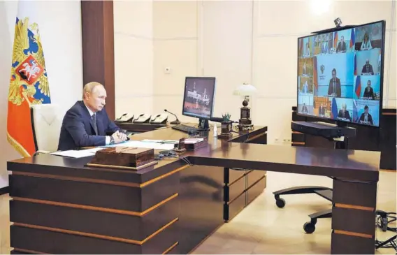  ??  ?? ► El Presidente Vladimir Putin, durante el anuncio del registro de la primera vacuna contra el coronaviru­s del mundo.