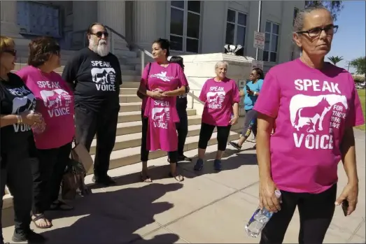  ?? JULIO MORALES PHOTO ?? Mikey Coffman-Garcia (right) said her and other like-minded animal rights advocates plan to continue to attend the criminal court hearings of locals accused of harming their pets or animals.