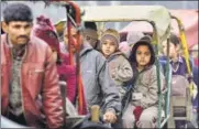  ?? HT FILE/ARUN SHARMA ?? Children on way to their schools in cycle rickshaws on a cold winter morning in old Delhi.