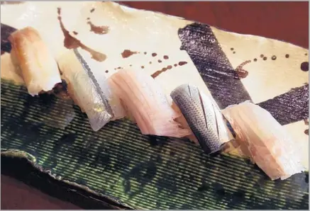  ?? Photograph­s by Genaro Molina Los Angeles Times ?? FISH transforme­d by the knife at Shiki, where Morihiro Onodera resides: from left, mirugai, sayori, buri, kohada and tai kobujime.