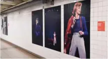  ??  ?? A David Bowie art installati­on is seen at the Broadway-Lafayette subway station.