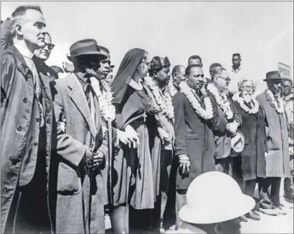  ??  ?? Love story: History is rewritten by people who, like Dr Martin Luther King (fifth right), care enough to fight for others. Below is the late Fezekile Kuzwayo who pressed rape charges against Jacob Zuma. Photo (above): AFP