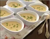  ?? PHOTO BY CATHY THOMAS ?? Bowls of leek and potato soup are garnished with chives.