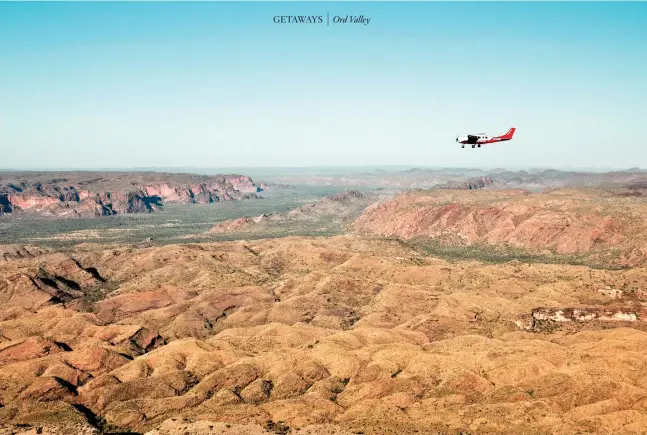  ??  ?? CLOCKWISE FROM ABOVE: A scenic flight makes a beeline for the Bungle Bungles in the World Heritage-listed Purnululu National Park ; Explore the spectacula­r natural rock formations of Mirima National Park ; Meet locals like Joan Simon at the Waringarri Aboriginal Arts centre.