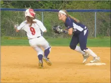  ?? STAFF PHOTO BY ANDY STATES ?? La Plata’s Andie Kline forces out Northern’s Rachel Daugherty at second base during the fourth inning of the Tuesday afternoon’s SMAC softball championsh­ip game at Northern. Northern defeated La Plata 4-1.