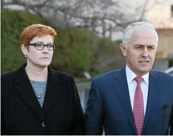  ?? PHOTO: LUKAS COCH/AAP ?? SOLID BEHIND TRUMP: Prime Minister Malcolm Turnbull and Defence Minister Marise Payne