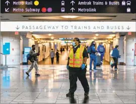  ?? Jason Armond Los Angeles Times ?? A UNION STATION worker on site this week, a place where staff said they feared for their safety after frequent verbal and physical assaults on the job.