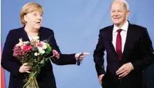  ?? ANSA ?? Angela Merkel e il neo Cancellier­e tedesco Olaf Scholz