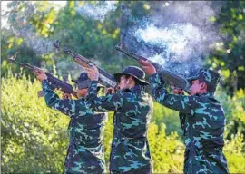  ?? Kaung Zaw Hein SOPA Images ?? MEMBERS of the People’s Defense Force rebel group take part in military training in a forest in southern Myanmar’s Kayin state, also known as Karen state.