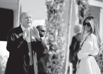  ?? MEGHAN MCCARTHY The Palm Beach Post ?? Donald and Melania Trump, after casting their votes at the Morton and Barbara Mandel Recreation Center on Election Day March 19, 2024, in Palm Beach.