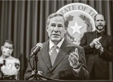  ?? Ricardo Brazziell / Austin American-Statesman ?? Gov. Greg Abbott did not address problems with the state’s COVID-19 data during his news conference Thursday on further reopenings in Texas. Democrats criticized him for abandoning earlier metrics.