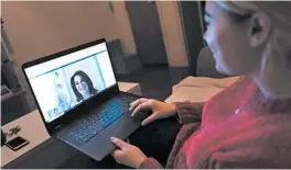  ?? MARK LENNIHAN/AP ?? A patient sits in her apartment in the Brooklyn borough of New York during a telemedici­ne video conference.
What does it cost?