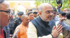  ?? SUBHANKAR CHAKRABORT­Y/HT PHOTO ?? ▪ BJP chief Amit Shah with chief minister Yogi Adityanath at the BJP party office in the state capital on Saturday.