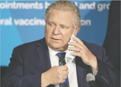  ?? CHRIS YOUNG / THE CANADIAN PRESS FILES ?? Ontario Premier Doug Ford announced further lockdown restrictio­ns Monday in the government’s latest effort to
combat the spread of the COVID-19 virus. Ford has decided to divert all schools to online learning indefinite­ly.