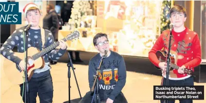  ??  ?? Busking triplets Theo, Isaac and Oscar Nolan on Northumber­land Street