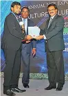  ??  ?? Foreconns Canneries Director Suhan Dharmasuri­ya receives the award