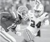  ?? JOHN RAOUX/AP ?? Miami cornerback Christian Williams (24) covers Florida wide receiver Van Jefferson.