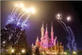  ?? WANG GANG / FOR CHINA DAILY ?? Fireworks light up a castle of the Shanghai Disney Resort.