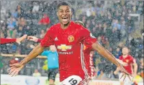  ?? Picture: AFP ?? JUBILANT: Manchester United’s English striker Marcus Rashford celebrates after scoring their late winning goal during his team’s English Premier League match against Hull City in Kingston upon Hull, north east England on Saturday. Manchester United won...