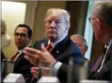  ?? EVAN VUCCI — THE ASSOCIATED PRESS ?? President Donald Trump listens during a meeting with Republican members of Congress on immigratio­n in the Cabinet Room of the White House, Wednesday in Washington.